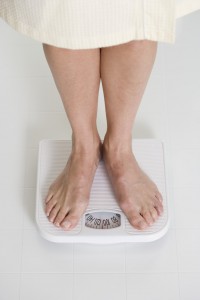 Woman Standing on Scale