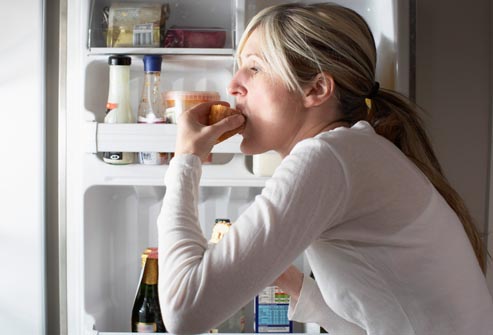 getty_rm_photo_of_woman_eating_snack