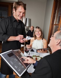 waiter-with-customers-iStock_000014531853XSmall